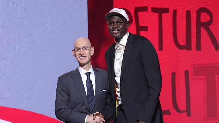 Jun 25, 2025; Brooklyn, NY, USA;  Khaman Maluach stands with NBA commissioner Adam Silver after being selected as the tenth pick by the Houston Rockets in the first round of the 2025 NBA Draft at Barclays Center.