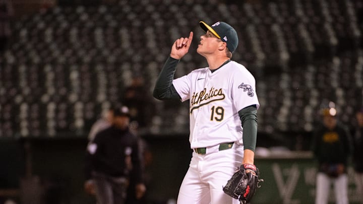 May 21, 2024; Oakland, California, USA; Oakland Athletics pitcher Mason Miller (19) celebrates after defeating the Colorado Rockies 5-4 at Oakland-Alameda County Coliseum. Mandatory Credit: Ed Szczepanski-USA TODAY Sports