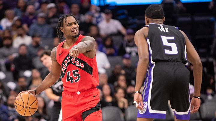 Nov 6, 2024; Sacramento, California, USA; Toronto Raptors guard Davion Mitchell (45) directs the offense during the third quarter against the Sacramento Kings at Golden 1 Center. Mandatory Credit: Ed Szczepanski-Imagn Images