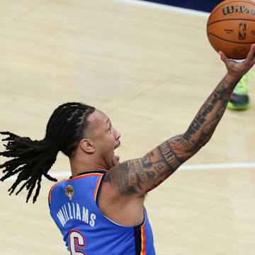 Jun 19, 2025; Indianapolis, Indiana, USA; Oklahoma City Thunder forward Jaylin Williams (6) shoots the ball against Indiana Pacers forward Aaron Nesmith (23) in the fourth quarter during game six of the 2025 NBA Finals at Gainbridge Fieldhouse. Mandatory Credit: Trevor Ruszkowski-Imagn Images