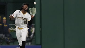 Sep 25, 2024; Pittsburgh, Pennsylvania, USA;  Pittsburgh Pirates center fielder Oneil Cruz (15) makes a catch for an out on a ball hit by Milwaukee Brewers right fielder Sal Frelick (not pictured) to end the seventh inning at PNC Park. Mandatory Credit: Charles LeClaire-Imagn Images