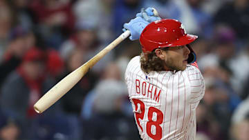 Apr 2, 2025; Philadelphia, Pennsylvania, USA; Philadelphia Phillies third base Alec Bohm (28) hits a single using a torpedo bat during the fourth inning against the Colorado Rockies at Citizens Bank Park.