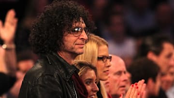 Jan 30, 2013; New York, NY, USA; King of all media Howard Stern applauds before the start of an NBA game between the New York Knicks and the Orlando Magic at Madison Square Garden. 