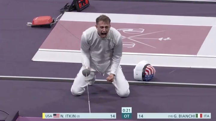 Itkin celebrates an overtime victory at the Paris Olympics.