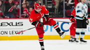 Feb 8, 2025; Raleigh, North Carolina, USA;  Carolina Hurricanes center Seth Jarvis (24) celebrates his goal against the Utah Hockey Club during the second period at Lenovo Center. Mandatory Credit: James Guillory-Imagn Images