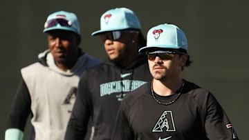 Arizona Diamondbacks' Corbin Carroll, Ketel Marte, and Geraldo Perdomo during spring training workouts at Salt River Fields at Talking Stick near Scottsdale on Feb. 19, 2024.