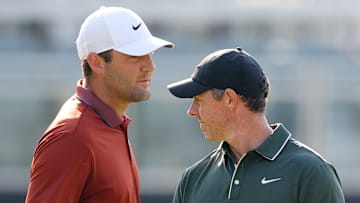 Scottie Scheffler and Rory McIlroy during the first round of the 2025 PGA Championship at Quail Hollow Club