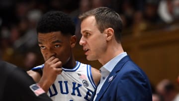 Jan 27, 2024; Durham, North Carolina, USA; Duke basketball head coach Jon Scheyer talks to guard Caleb Foster