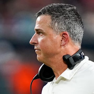 Nov 8, 2025; Miami Gardens, Florida, USA; Miami Hurricanes head coach Mario Cristobal gives his team instructions against the Syracuse Orange during the third quarter at Hard Rock Stadium. Mandatory Credit: Jeff Romance-Imagn Images