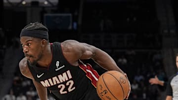 Oct 8, 2024; Charlotte, North Carolina, USA; Miami Heat forward Jimmy Butler (22) drives to the basket against the Charlotte Hornets during the second quarter at Spectrum Center. Mandatory Credit: Jim Dedmon-Imagn Images