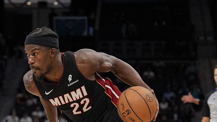 Oct 8, 2024; Charlotte, North Carolina, USA; Miami Heat forward Jimmy Butler (22) drives to the basket against the Charlotte Hornets during the second quarter at Spectrum Center. Mandatory Credit: Jim Dedmon-Imagn Images
