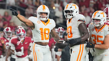 Tennessee running back DeSean Bishop (18) signals the first down during a college football game against Alabama at Bryant-Denny Stadium in Tuscaloosa, Ala., on Oct. 18, 2025.