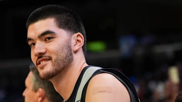 Grizzlies' Zach Edey (14) and Santi Aldama (7) sit on the bench during open practice at the FedExForum on October 4, 2025, in Memphis, Tenn.