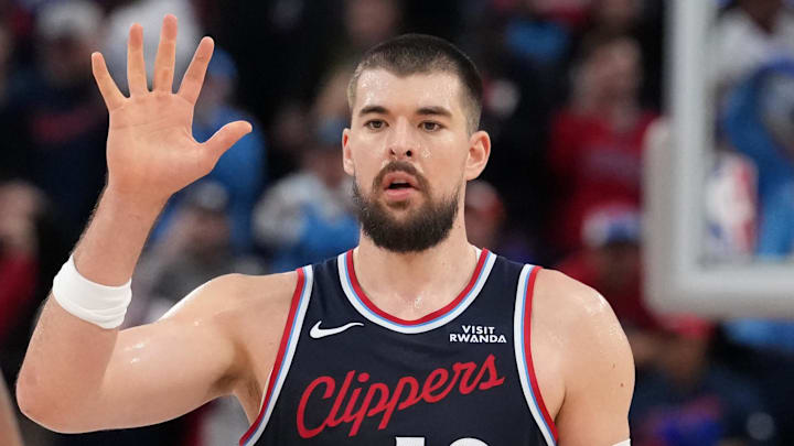 Jan 5, 2026; Inglewood, California, USA; LA Clippers center Ivica Zubac (40) celebrates with forward Kawhi Leonard (2) against the Golden State Warriors in the second half at Intuit Dome. Mandatory Credit: Kirby Lee-Imagn Images