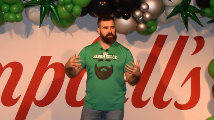 Retired Eagle Jason Kelce, wearing a shirt that promotes his Legend Edition Chunky soup can, addresses some 600 Campbell Soup Co. workers during a visit to the firm's Camden headquarters on March 20.