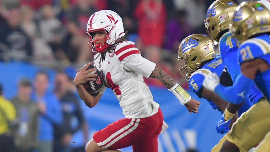 Nebraska Cornhuskers quarterback TJ Lateef runs the ball against the UCLA Bruins during the first half at the Rose Bowl. 