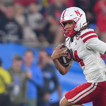 Nebraska Cornhuskers quarterback TJ Lateef runs the ball against the UCLA Bruins during the first half at the Rose Bowl. 