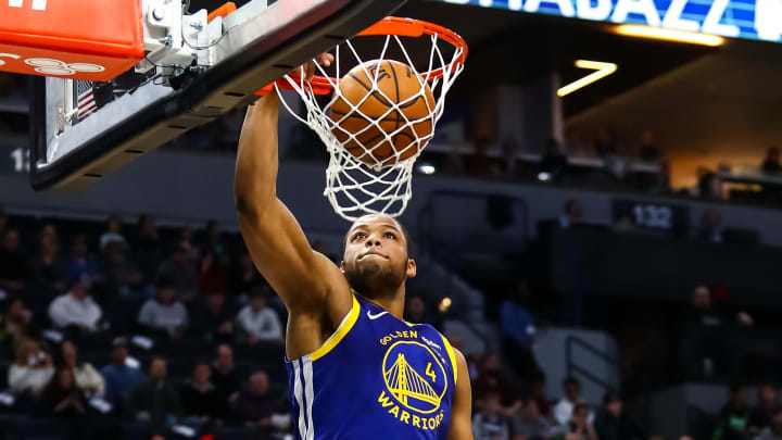 Jan 2, 2020; Minneapolis, Minnesota, USA; Golden State Warriors forward Omari Spellman (4) dunks the ball in the first quarter against the Minnesota Timberwolves at Target Center. Mandatory Credit: David Berding-USA TODAY Sports