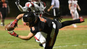 Jayvan Boggs of Cocoa makes an incredible catch despite the defense of Dunnellon   s Damien Hemmings in the FHSAA football playoffs Friday, November 17, 2023. Craig Bailey/FLORIDA TODAY via USA TODAY NETWORK