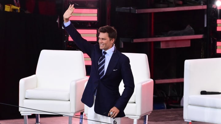 Former Patriots quarterback Tom Brady is introduced to fans during his Patriots Hall of Fame induction ceremony.