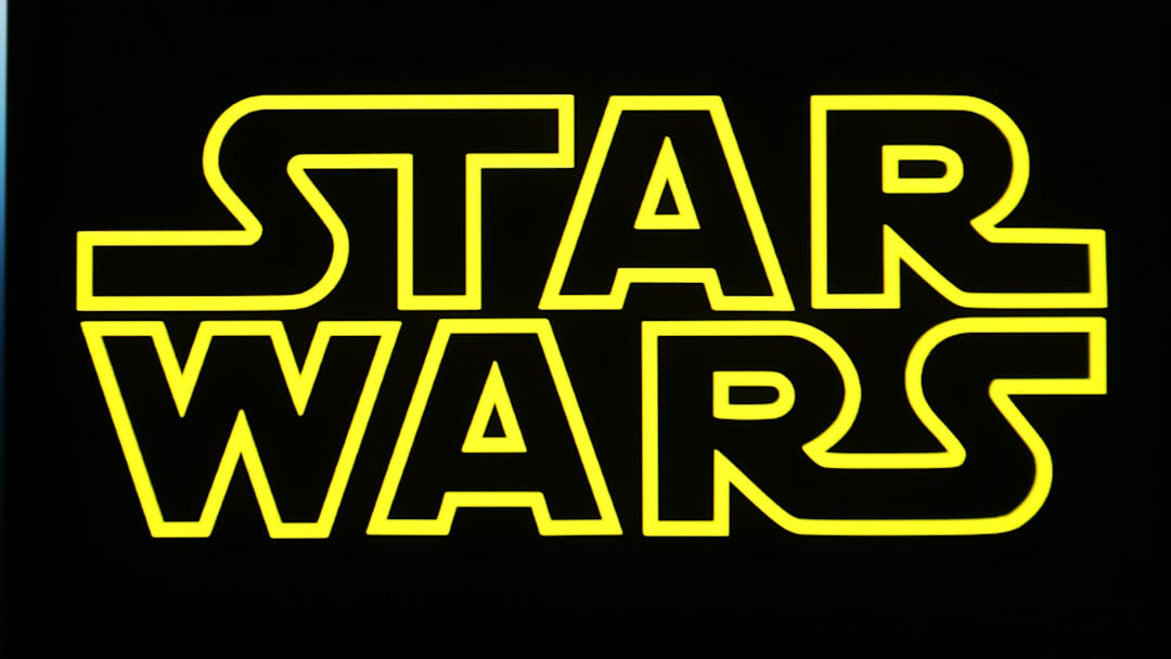 In this photo illustration, a Star Wars logo is seen.