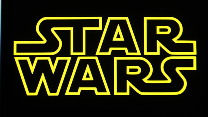 In this photo illustration, a Star Wars logo is seen.