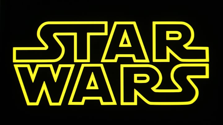 In this photo illustration, a Star Wars logo is seen on a...