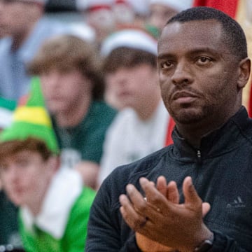 Christ School   sl head basketball coach, Joshua Coley, watches the Greenies take on Legion Collegiate Academy, December 12, 2023.