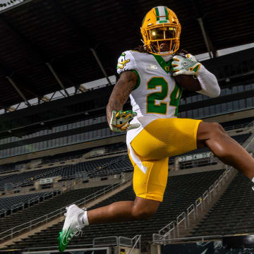 The third of Oregon Ducks football's "Generation O" uniforms, the Mighty Oregon uniform is inspired by "The Catch".