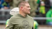 Oregon defensive coordinator Tosh Lupoi walks the field during the Oregon Ducks’ Spring Game Saturday, April 27. 2024 at Autzen Stadium in Eugene, Ore.