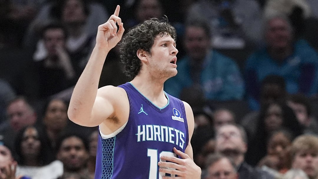 Feb 11, 2026; Charlotte, North Carolina, USA; Charlotte Hornets center PJ Hall (16) calls to look at the replace after a foul call during the second half against the Atlanta Hawks at Spectrum Center. Mandatory Credit: Jim Dedmon-Imagn Images