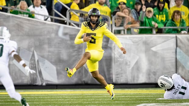 Oregon Ducks quarterback Dante Moore runs the ball as the Ducks host the Spartans Friday, Oct. 4, 2024 at Autzen Stadium in E
