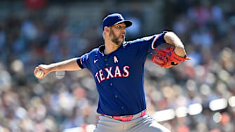 May 11, 2025; Detroit, Michigan, USA; Texas Rangers pitcher Chris Martin (55) throws a pitch against the Detroit Tigers in the eighth inning at Comerica Park. 