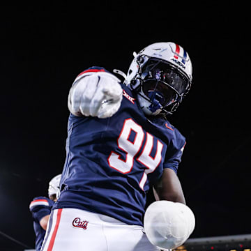 Aug 30, 2025; Tucson, Arizona, USA; Arizona Wildcats defensive lineman Eduwa Okundaye (94) points at the camera after kickoff during the third quarter of the game against the Hawaii Rainbow Warriors at Arizona Stadium. Mandatory Credit: Aryanna Frank-Imagn Images