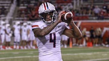 Sep 28, 2024; Salt Lake City, Utah, USA; Arizona Wildcats wide receiver Tetairoa McMillan (4) warms up before a game against the Utah Utes at Rice-Eccles Stadium. Mandatory Credit: Rob Gray-Imagn Images