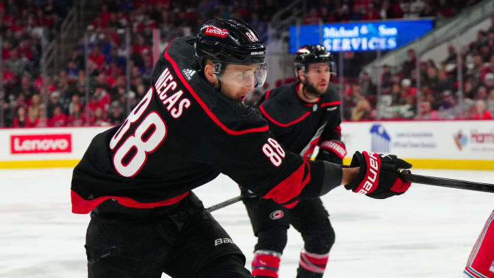 May 11, 2024; Raleigh, North Carolina, USA; Carolina Hurricanes center Martin Necas (88) takes a shot against the New York Rangers during the first period in game four of the second round of the 2024 Stanley Cup Playoffs at PNC Arena. Mandatory Credit: James Guillory-USA TODAY Sports