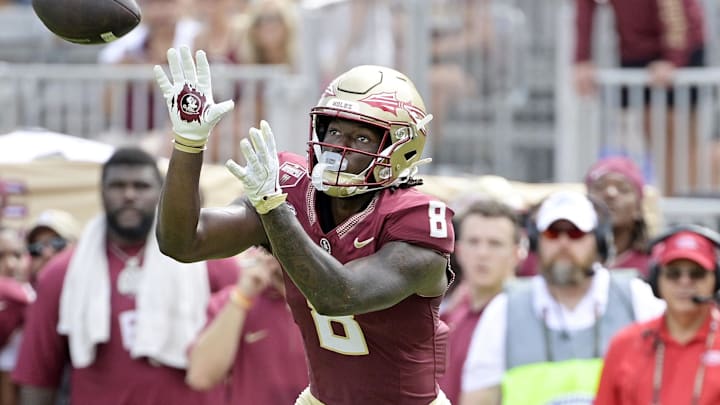 Sep 14, 2024; Tallahassee, Florida, USA; Florida State Seminoles wide receiver Hykeem Williams (8) catches the ball against the Memphis Tigers during the second half at Doak S. Campbell Stadium. Mandatory Credit: Melina Myers-Imagn Images