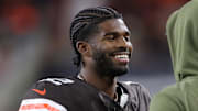 Cleveland Browns quarterback Shedeur Sanders (12) is all smiles as he chats on the sideline during the second half of an NFL football game at Huntington Bank Field, Nov. 16, 2025, in Cleveland, Ohio.