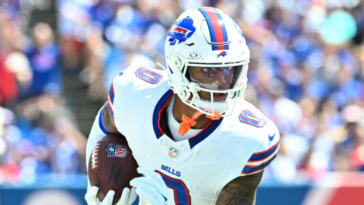 Aug 10, 2024; Orchard Park, New York, USA; Buffalo Bills wide receiver Keon Coleman (0) runs with the ball after a catch in the second quarter of a pre-season game against the Chicago Bears at Highmark Stadium. Mandatory Credit: Mark Konezny-USA TODAY Sports