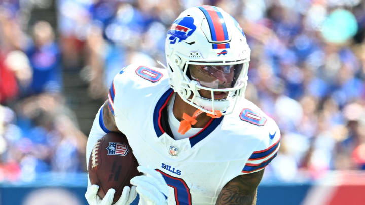 Aug 10, 2024; Orchard Park, New York, USA; Buffalo Bills wide receiver Keon Coleman (0) runs with the ball after a catch in the second quarter of a pre-season game against the Chicago Bears at Highmark Stadium. Mandatory Credit: Mark Konezny-USA TODAY Sports