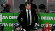 Michigan State head coach Adam Nightingale watches a play against Michigan during the first period of Duel in the D at Little Caesars Arena in Detroit on Saturday, Feb. 8, 2025.
