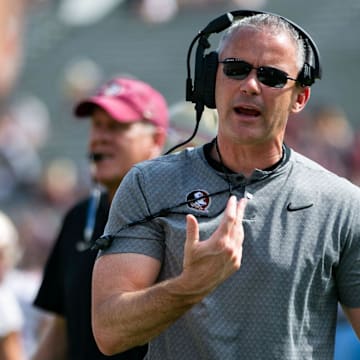 Florida State Seminoles head coach Mike Norvell gets pumped up after a play. Seminole fans watched as the Florida State football team hosted the FSU Garnet and Gold Spring Showcase on Saturday, April 15, 2023.

Fsu Spring Game712