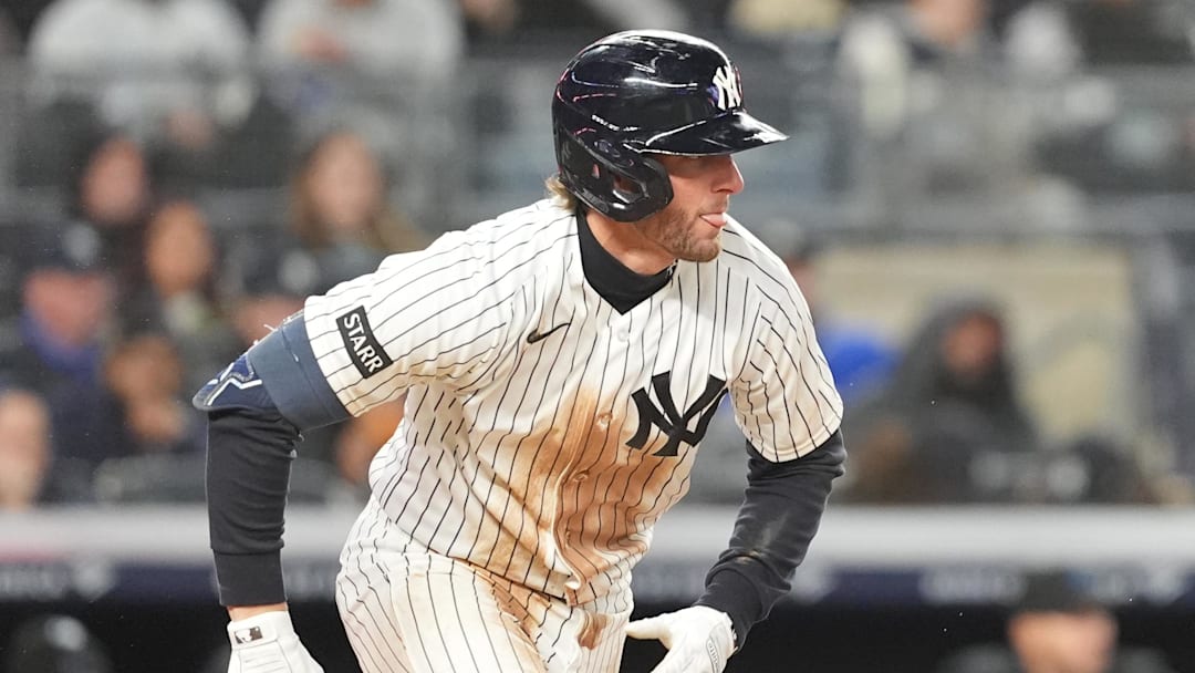 New York Yankees third baseman Ryan McMahon (19) runs out a ground ball and is safe on a fielding error by the Miami Marlins during the third inning at Yankee Stadium.