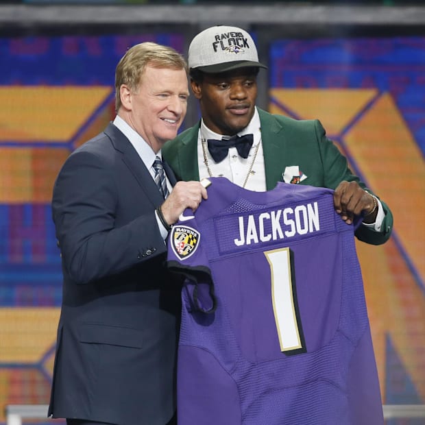 Apr 26, 2018; Arlington, TX, USA; Lamar Jackson (Louisville) with NFL commissioner Roger Goodell after being selected as the 