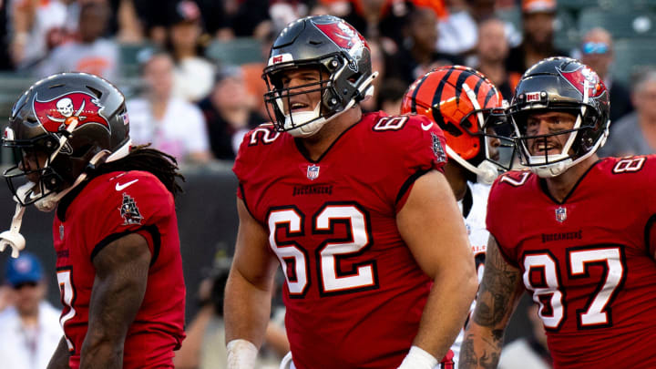 Tampa Bay Buccaneers running back Bucky Irving (7) and Tampa Bay Buccaneers center Graham Barton (62) react after he scored a touchdown in the second quarter of the NFL preseason game against the Cincinnati Bengals at Paycor Stadium in Cincinnati on Saturday, August 10, 2024.