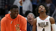 Mar 27, 2022; New Orleans, Louisiana, USA; New Orleans Pelicans forward Zion Williamson reacts to a play with guard Devonte' Graham (4) in the second half against the Los Angeles Lakers at the Smoothie King Center. The Pelicans won, 116-108. Mandatory Credit: Chuck Cook-Imagn Images