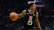 April 5, 2019; Los Angeles, CA, USA; Los Angeles Clippers guard Lou Williams (23) controls the ball against the Los Angeles Lakers during the second half at Staples Center. Mandatory Credit: Gary A. Vasquez-Imagn Images