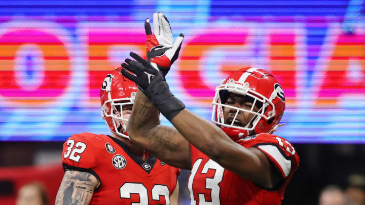 Dec 31, 2022; Atlanta, Georgia, USA; Georgia Bulldogs defensive lineman Mykel Williams (13) reacts after a play against the Ohio State Buckeyes during the first half of the 2022 Peach Bowl at Mercedes-Benz Stadium. Mandatory Credit: Brett Davis-USA TODAY Sports