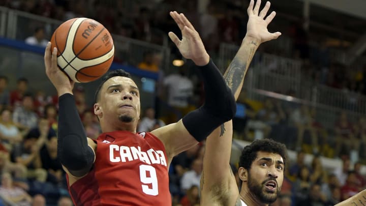 Jul 25, 2015; Toronto, Ontario, CAN; Canada forward Dillon Brooks (9) shoots the ball against Brazil center Augusto Lima (6) in the men's basketball gold medal game during the 2015 Pan Am Games at Ryerson Athletic Centre. Mandatory Credit: John David Mercer-USA TODAY Sports