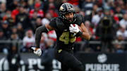 Purdue Boilermakers running back Devin Mockobee (45) rushes the ball 